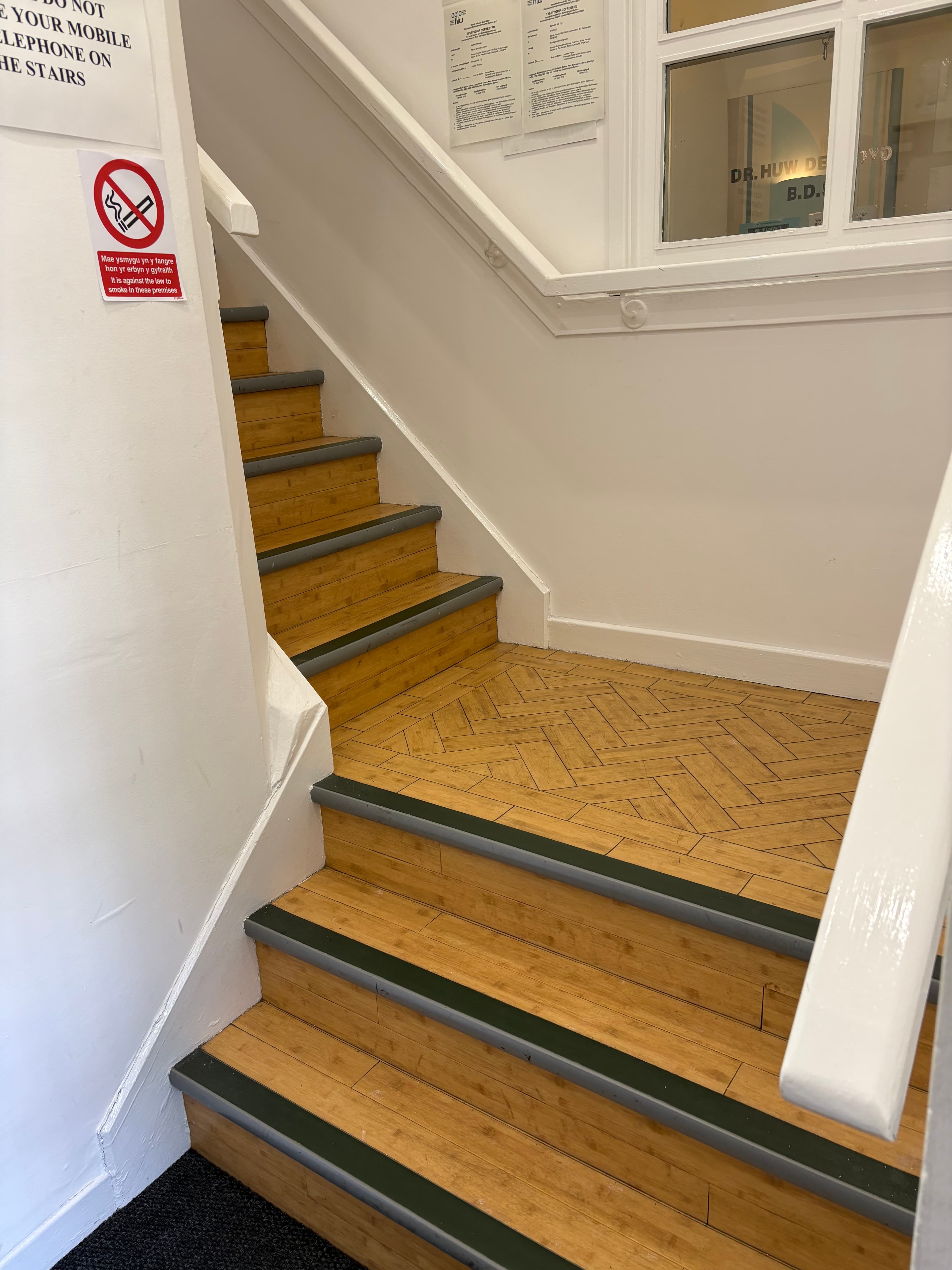 View looking down the staircase to the practice entrance